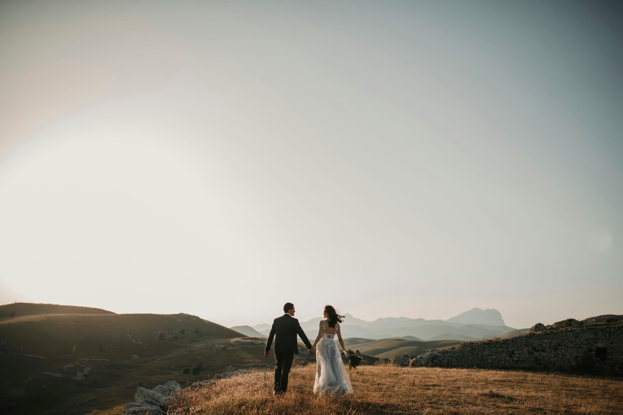 Cover of the Lnsly sample client gallery: a bride and groom at sunset
